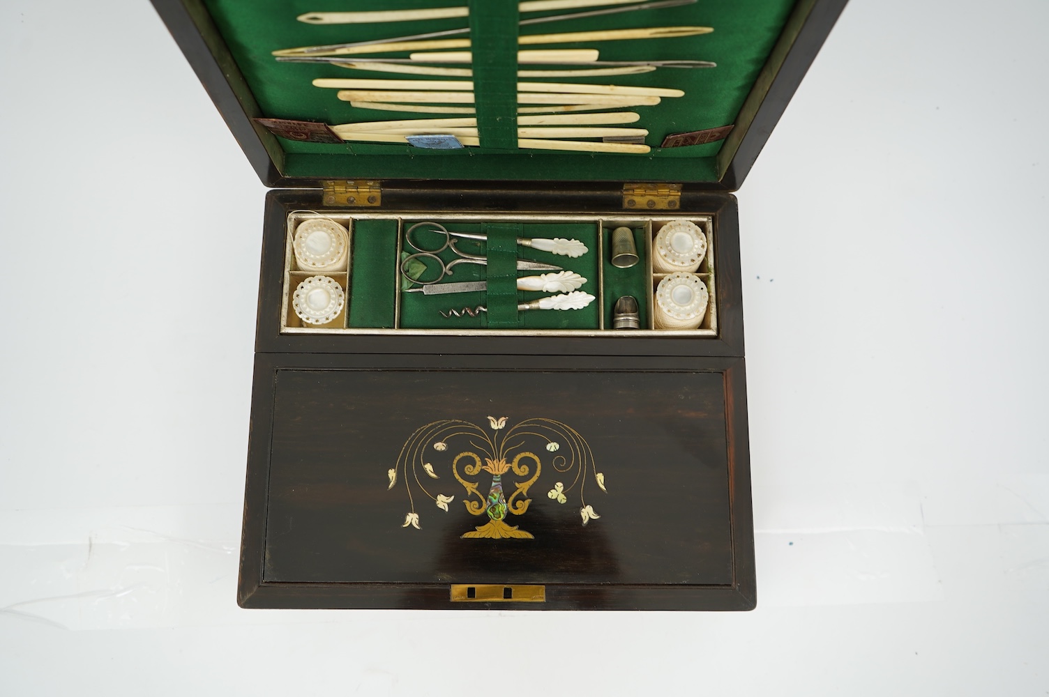 A mid 19th century rosewood writing and sewing box